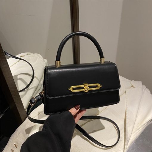 Wide Golden Lock Bag